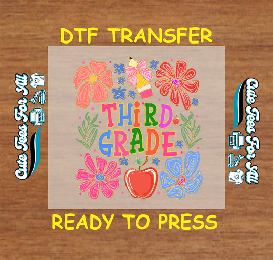 Third Grade DTF transfer with colorful sketched flowers, green leaves, apple, and pencil with pink bow.