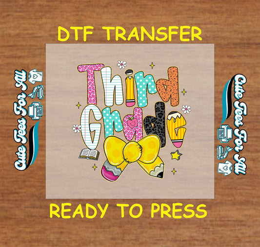Third Grade DTF transfer with yellow bow, pencils, book, and bold patterned letters.
