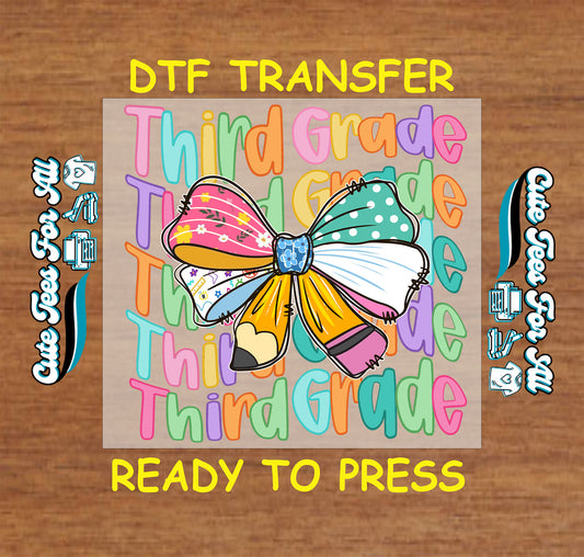 Third Grade DTF transfer with school supply bow and repeating rainbow “Third Grade” text.