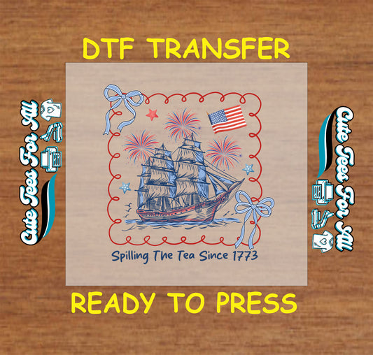 DTF transfer with colonial ship, fireworks, American flag, bows, and “Spilling the Tea Since 1773” quote.