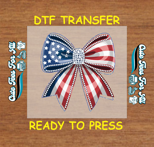 DTF transfer with rhinestone-styled USA bow in red, white, and blue with stars.