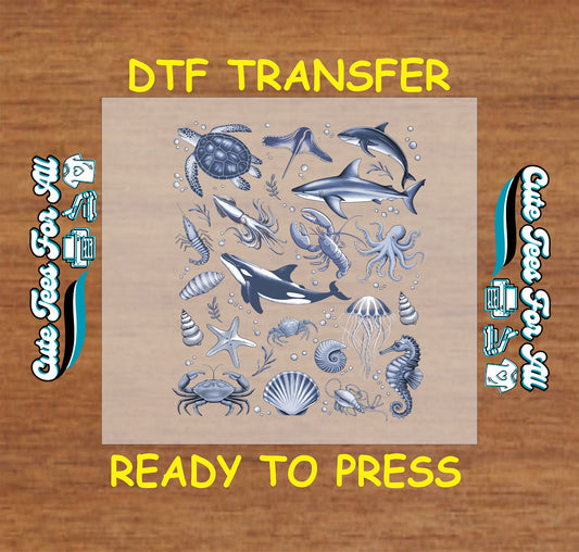DTF transfer with ocean animals including shark, orca, jellyfish, sea turtle, octopus, starfish, and shells.