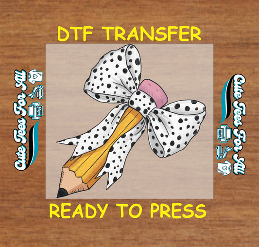 DTF transfer featuring a yellow pencil with black polka dot bow and pink eraser.