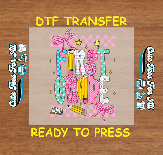 First grade DTF transfer with checkered pink background, colorful letters, pencil, bows, and stars.