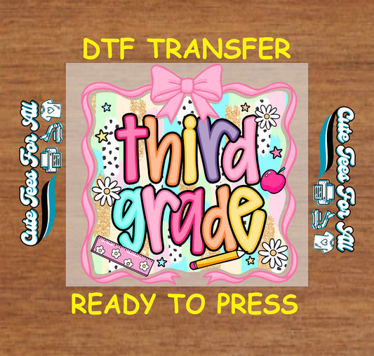 Third grade DTF transfer with glitter background, ruler, pencil, bow, and apple.