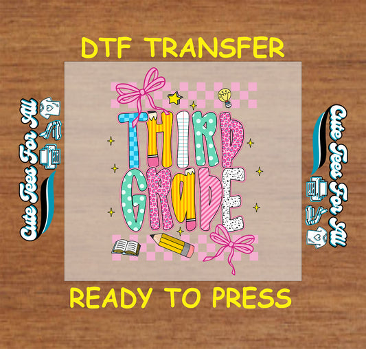 Third grade DTF transfer with leopard print letters, pencil, book, bows, and lightbulb.