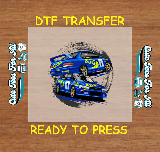 DTF transfer of blue rally sedan with racing livery and gold wheels in motion.