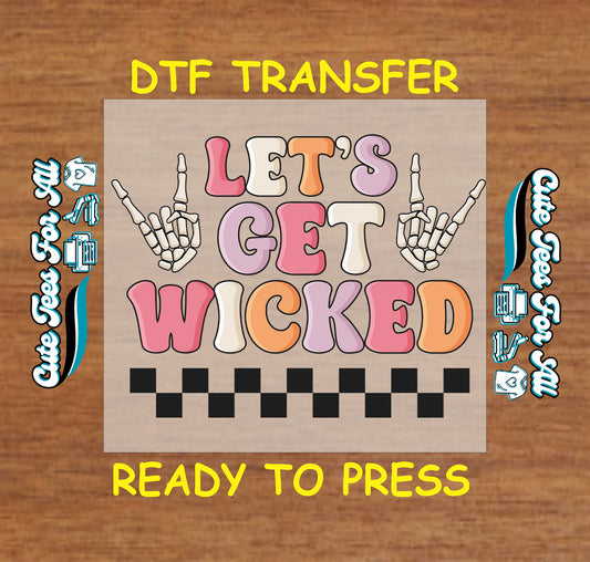 DTF transfer with “Let’s Get Wicked” pastel bubble text, skeleton hands, and checkerboard

