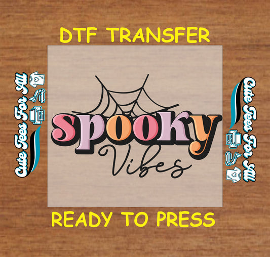 Spooky Vibes DTF transfer with pastel letters, script font, and spiderweb accent

