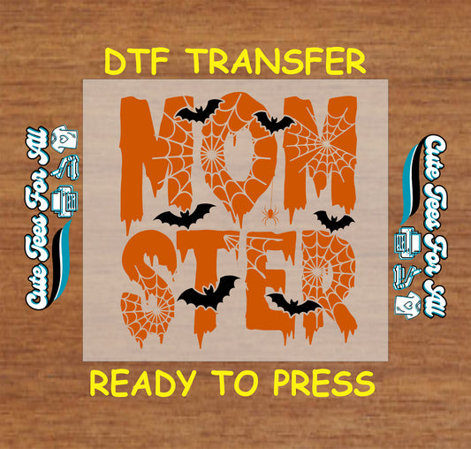 Momster Halloween DTF transfer with spiderwebs, bats, and orange dripping letters


