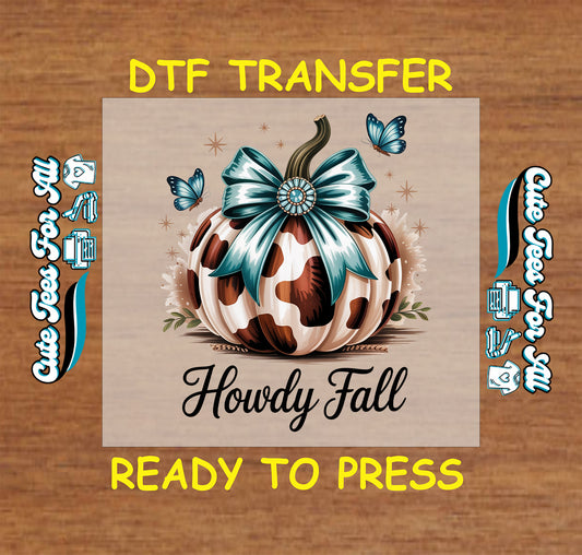 Ready to press dtf transfer with cow print pumpkin, turquoise bow, butterflies, and western fall text

