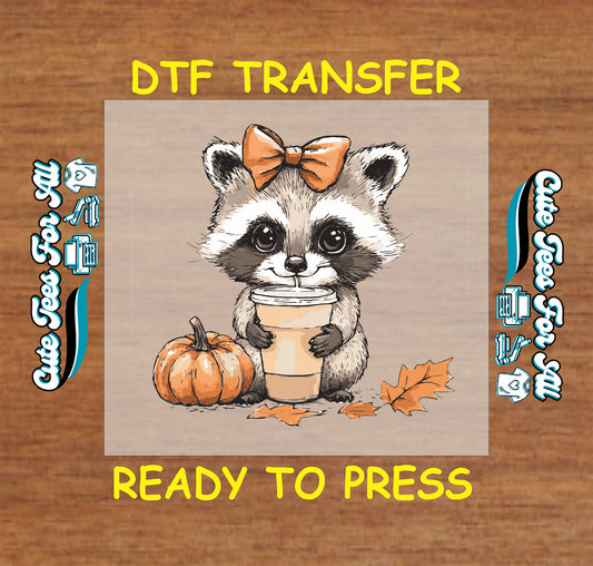Fall raccoon with coffee cup pumpkin and orange bow ready to press DTF transfer for DIY shirts