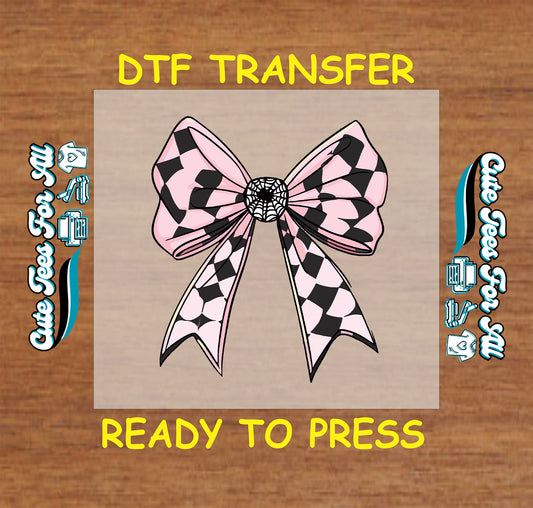 Halloween pink and black harlequin check bow with spiderweb center ready to press dtf transfer