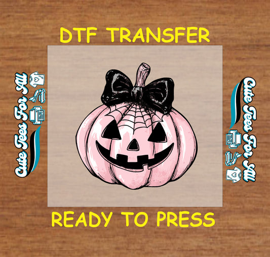 Halloween pink jack o lantern with black bow and spiderweb ready to press dtf transfer