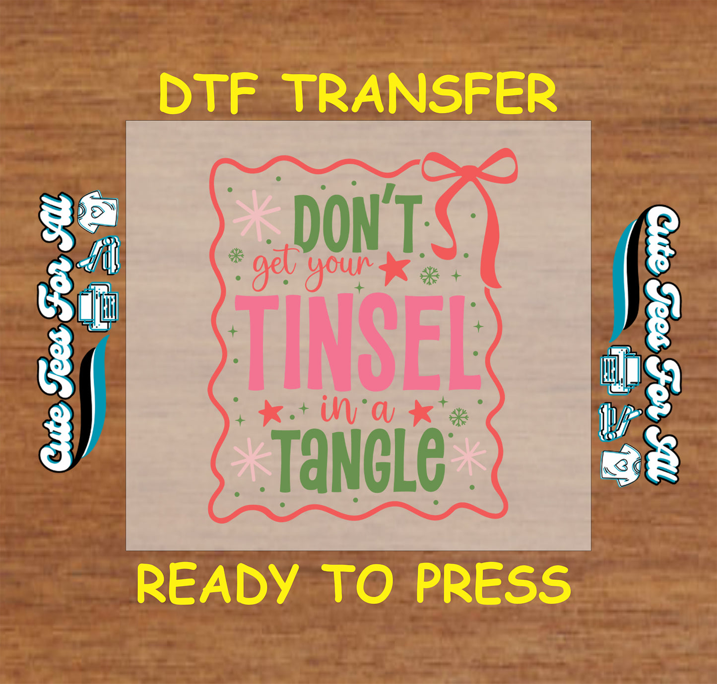 Christmas DTF transfer with phrase Don’t Get Your Tinsel in a Tangle in pink and green with festive bow and stars, ready to press dtf heat transfer