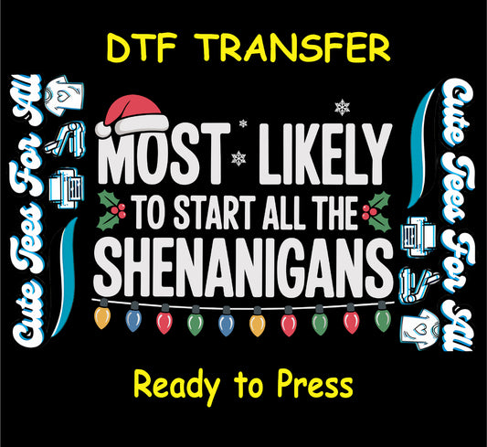 Christmas ready to press DTF transfer with "Most Likely to Start All the Shenanigans" text, Santa hat, holly, snowflakes, and colorful Christmas lights.