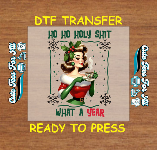 Christmas DTF transfer with retro pinup lady holding coffee cup and text “Ho Ho Holy Shit What a Year,” ready to press iron on heat transfer for DIY shirts.