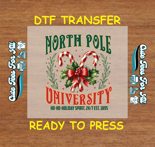 Christmas DTF transfer featuring candy canes and red bow with text “North Pole University,” ready to press iron on heat transfer for DIY shirts.