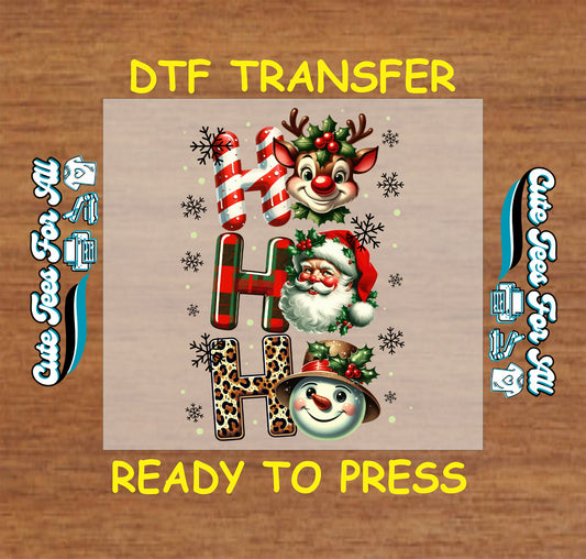 Christmas DTF transfer featuring reindeer, Santa, and snowman with text “Ho Ho Ho,” ready to press iron on heat transfer for DIY shirts.