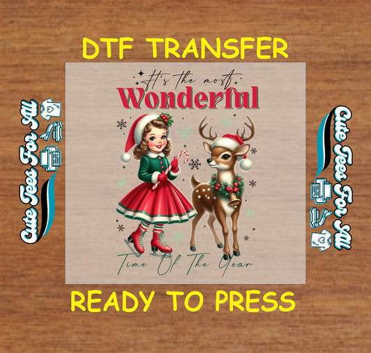 Christmas DTF transfer featuring girl in red dress with reindeer and the phrase “It’s the Most Wonderful Time of the Year,” ready to press iron on heat transfer for DIY shirts.