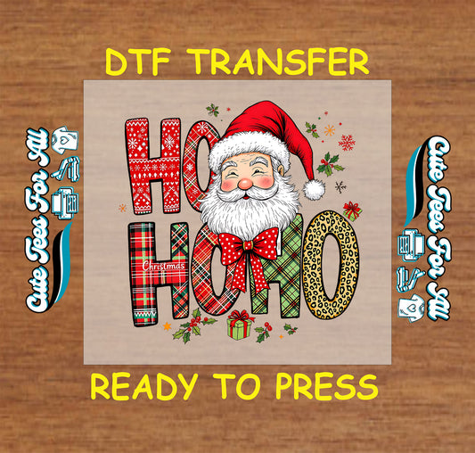 Christmas DTF transfer with Santa face and “Ho Ho Ho” patterned letters in plaid, leopard, and festive textures, ready to press iron on heat transfer for DIY shirts.