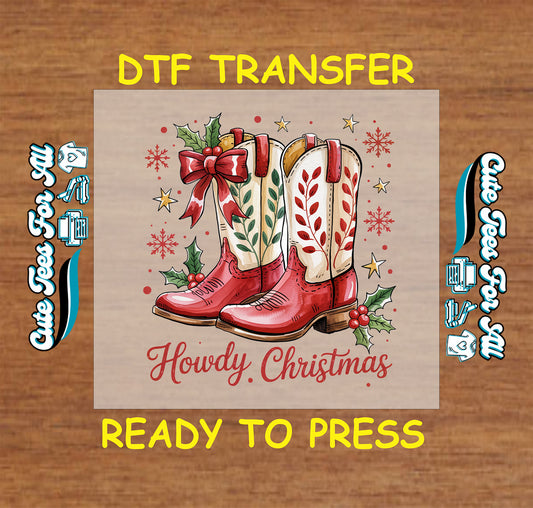 western christmas dtf transfer red cowboy boots with holly bow and howdy christmas text ready to press iron on heat transfer for diy shirts