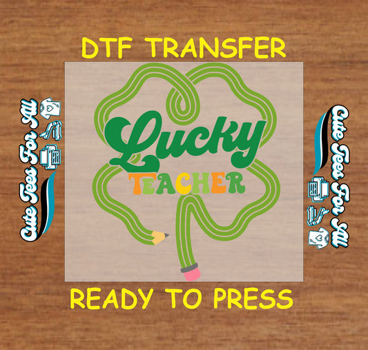 Ready to press dtf St Patricks Day teacher transfer with lucky teacher text shamrock pencil graphic for DIY shirts