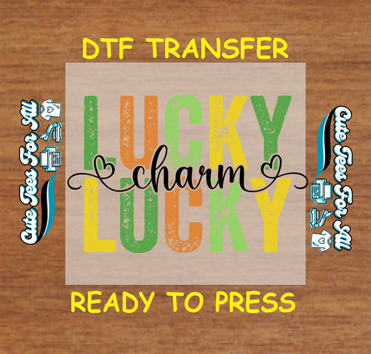 Ready to press dtf St Patricks Day transfer with lucky charm text in festive typography for DIY shirts