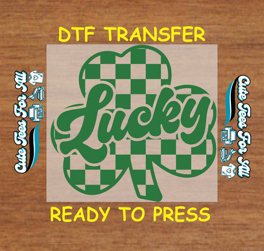 ready to press dtf transfer with lucky script over checkerboard shamrock for st patricks day diy shirts