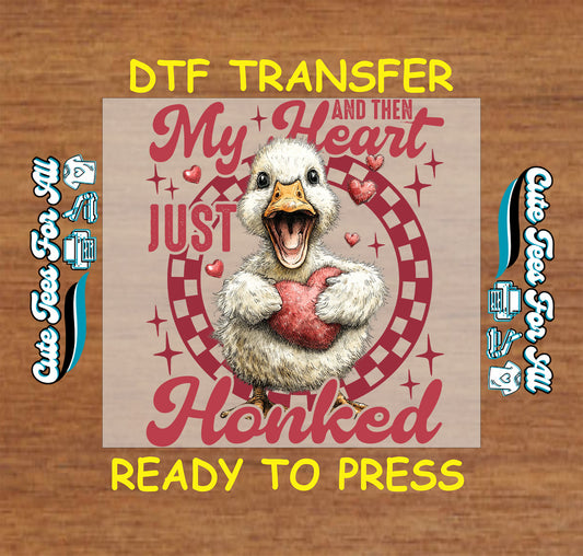 Valentine ready to press dtf transfer with duck holding heart and my heart just honked phrase in playful illustrated style for DIY shirts