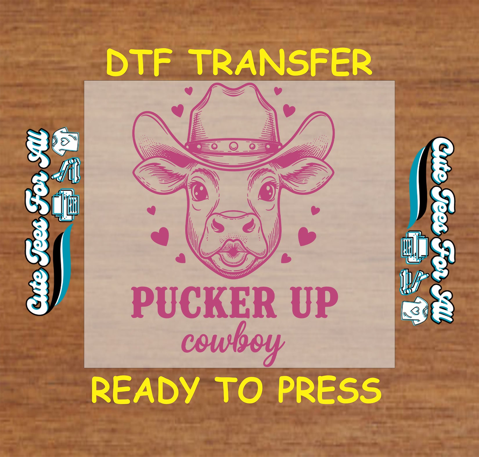 Cow with cowboy hat and 'Pucker Up Cowboy' text on a DTF transfer sheet, ready to press.