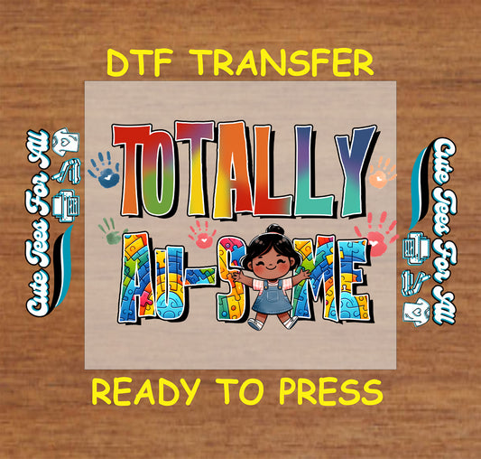 Ready to press dtf autism transfer with Totally Au-Some puzzle lettering, child illustration, and colorful handprints