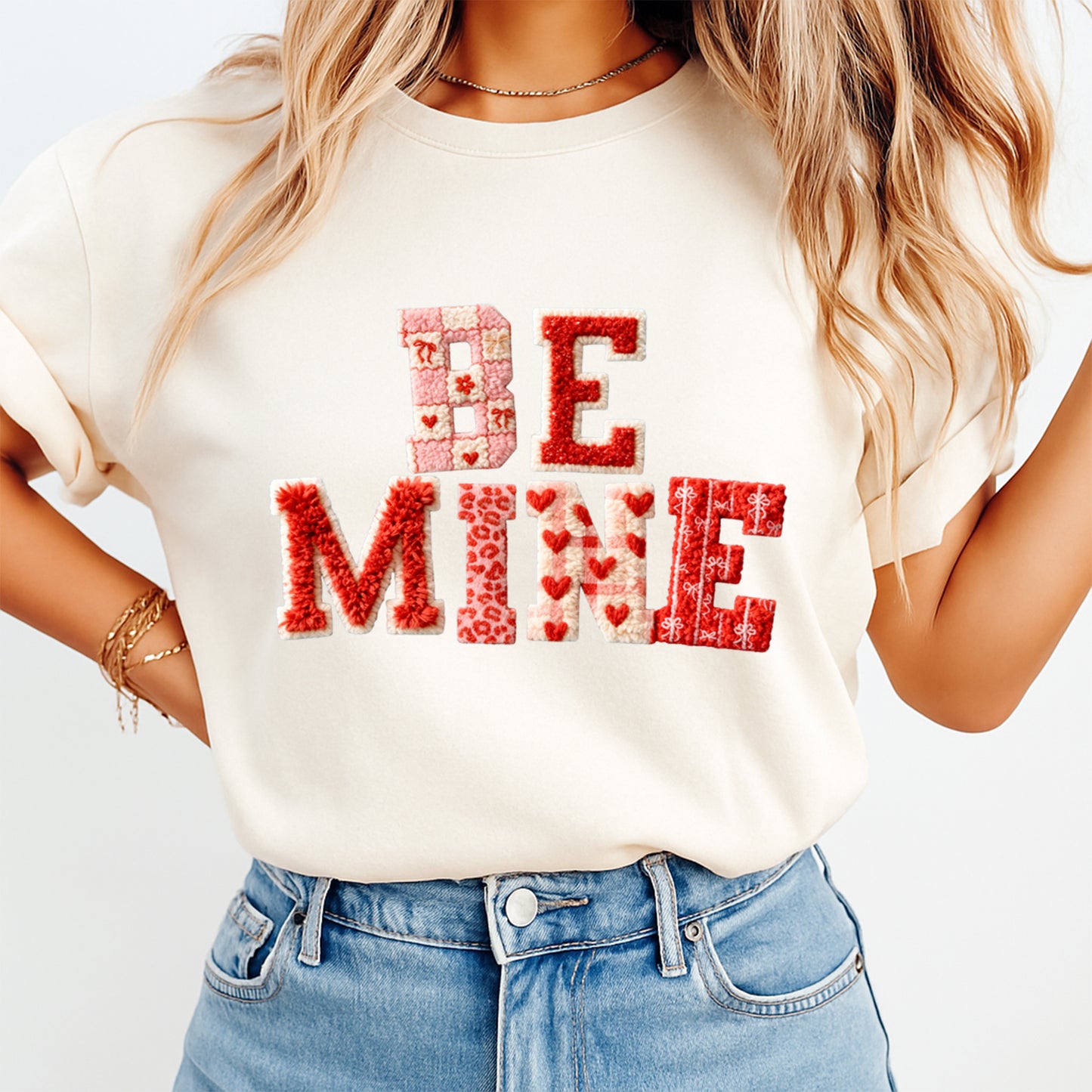 women wearing t shirt with Be Mine patchwork lettering with hearts and stitched Valentine patterns, ready to press dtf iron on heat transfer for DIY shirts
