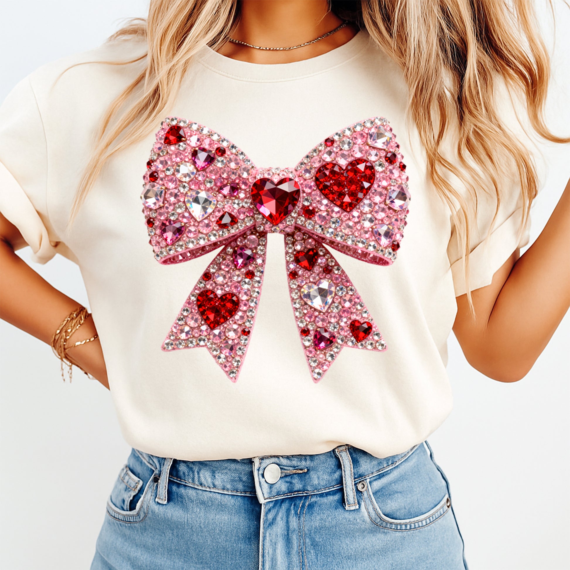 women wearing t shirt with Pink rhinestone heart bow graphic with crystal gem details, ready to press dtf iron on heat transfer for DIY Valentine shirts