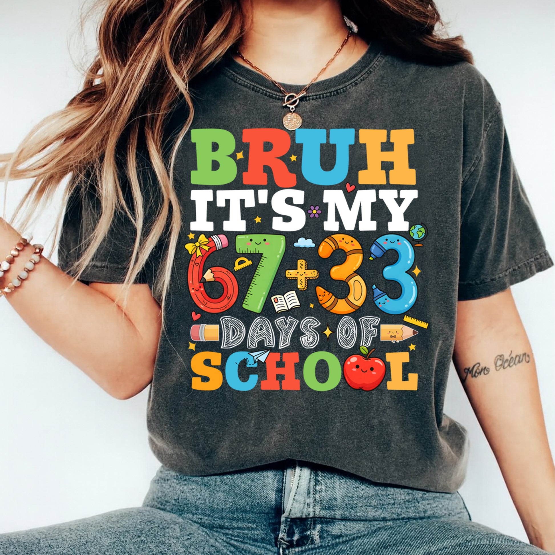 Ready to press dtf school transfer mockup shown pressed on a shirt, featuring “Bruh it’s my 67+33 days of school” with colorful classroom icons and numbers