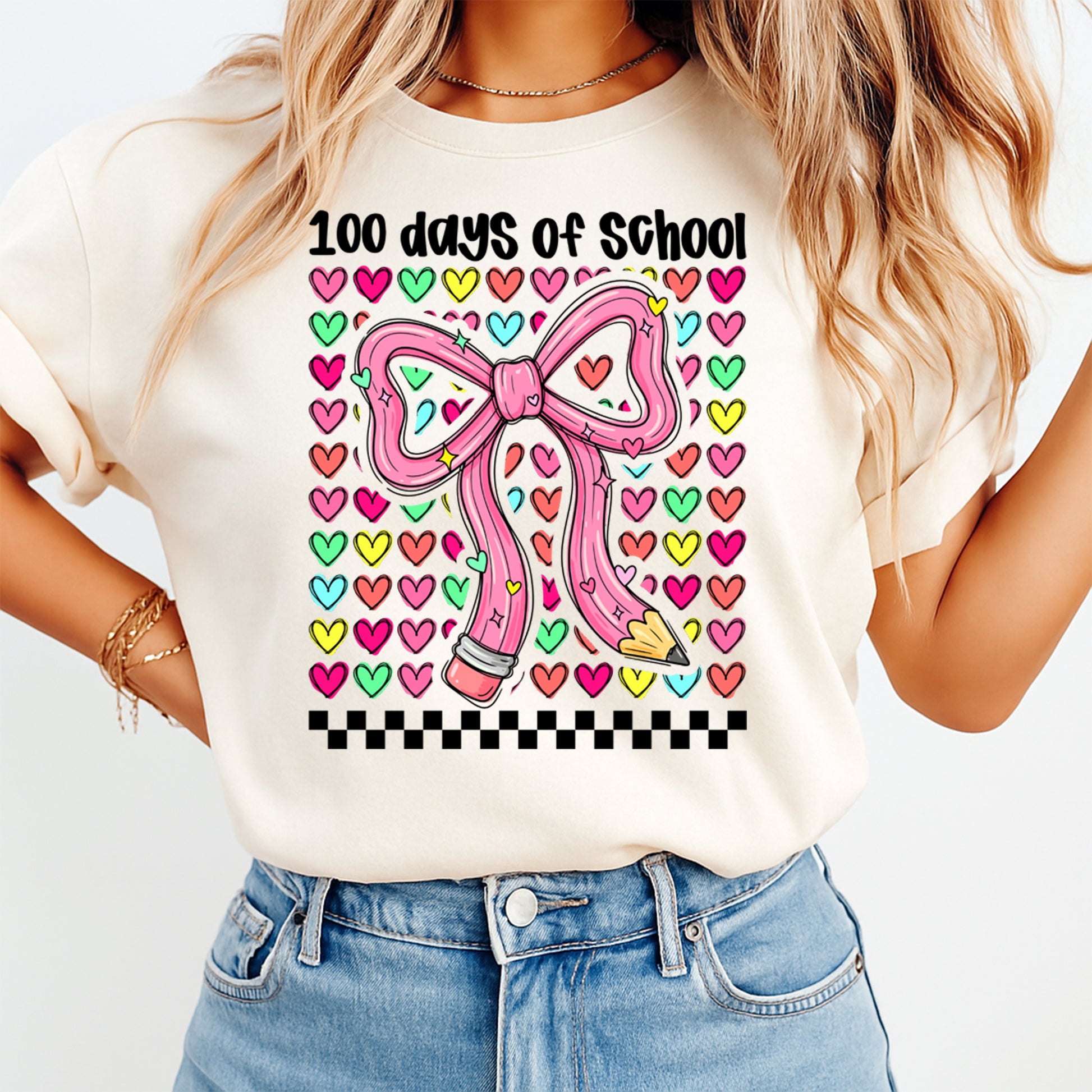 women wearing shirt with 100 days of school pencil bow with colorful hearts