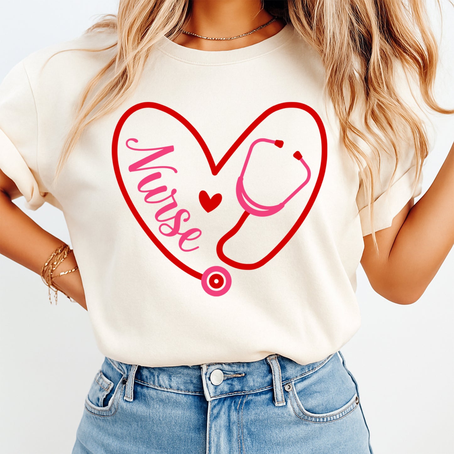 women wearing shirt with pink nurse heart stethoscope design