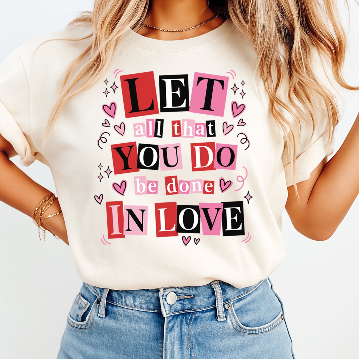 women wearing shirt with let all that you do be done in love design