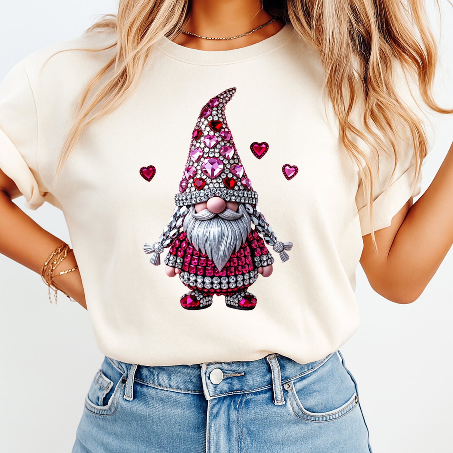 woman wearing cream shirt with valentine gnome ready to press dtf transfer featuring rhinestone heart hat gemstone details and festive heart accents