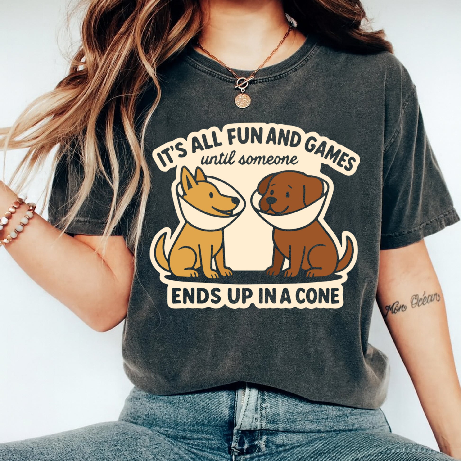 Funny dog cone graphic displayed on a shirt mockup featuring two dogs sitting with protective cones and humorous pet owner quote