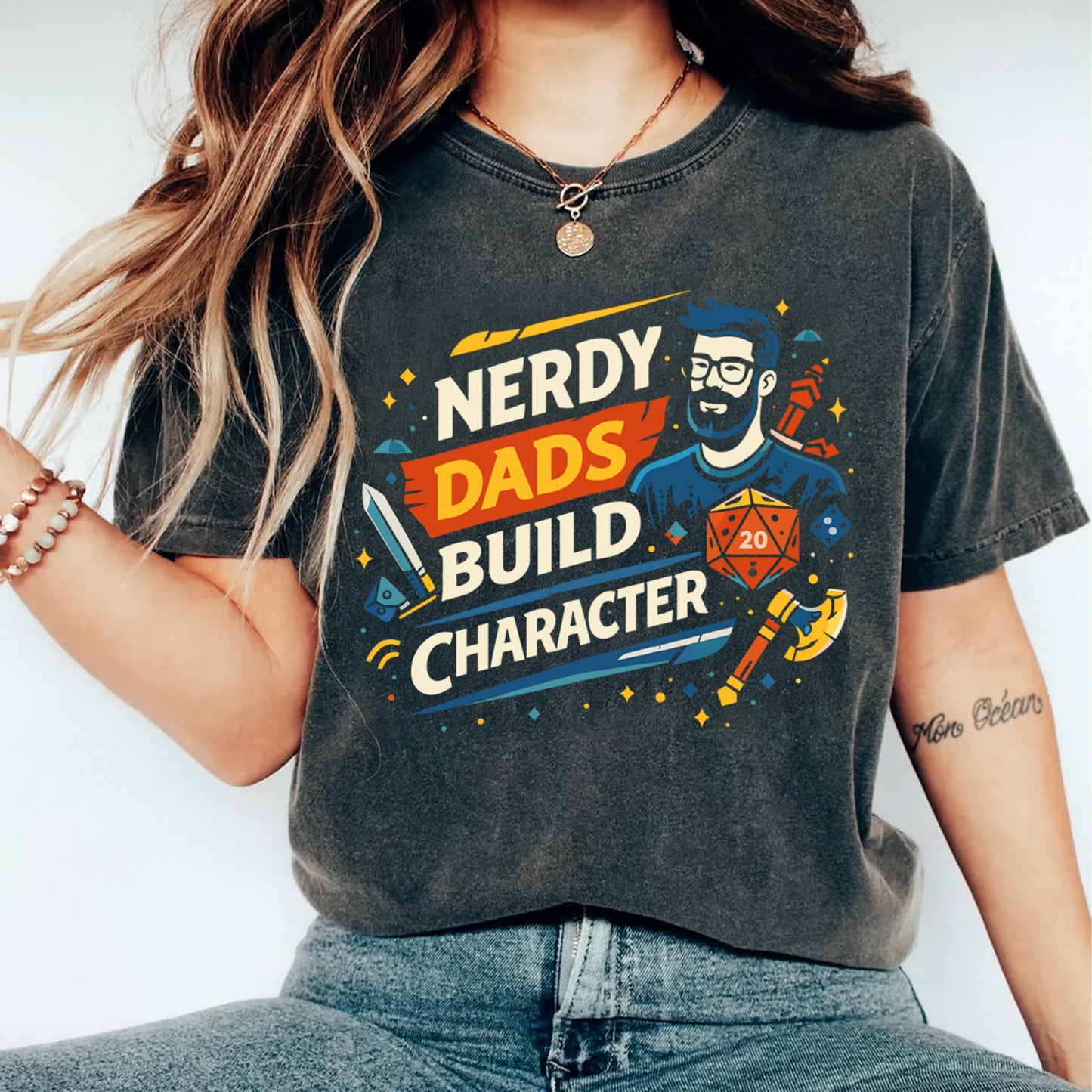 Nerdy dads build character graphic displayed on a shirt mockup with bearded dad illustration and role playing game elements
