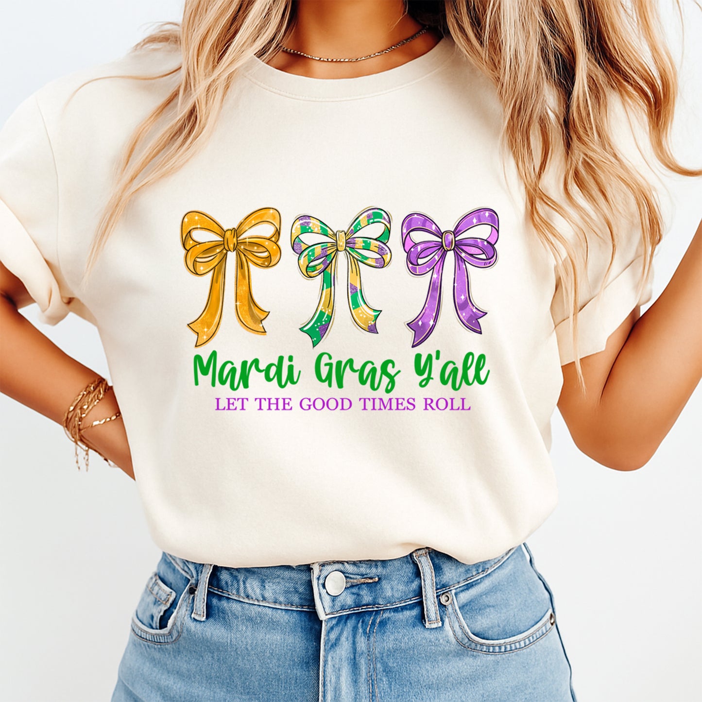 Mardi gras bow graphic displayed on a light color t shirt mockup with festive parade themed lettering