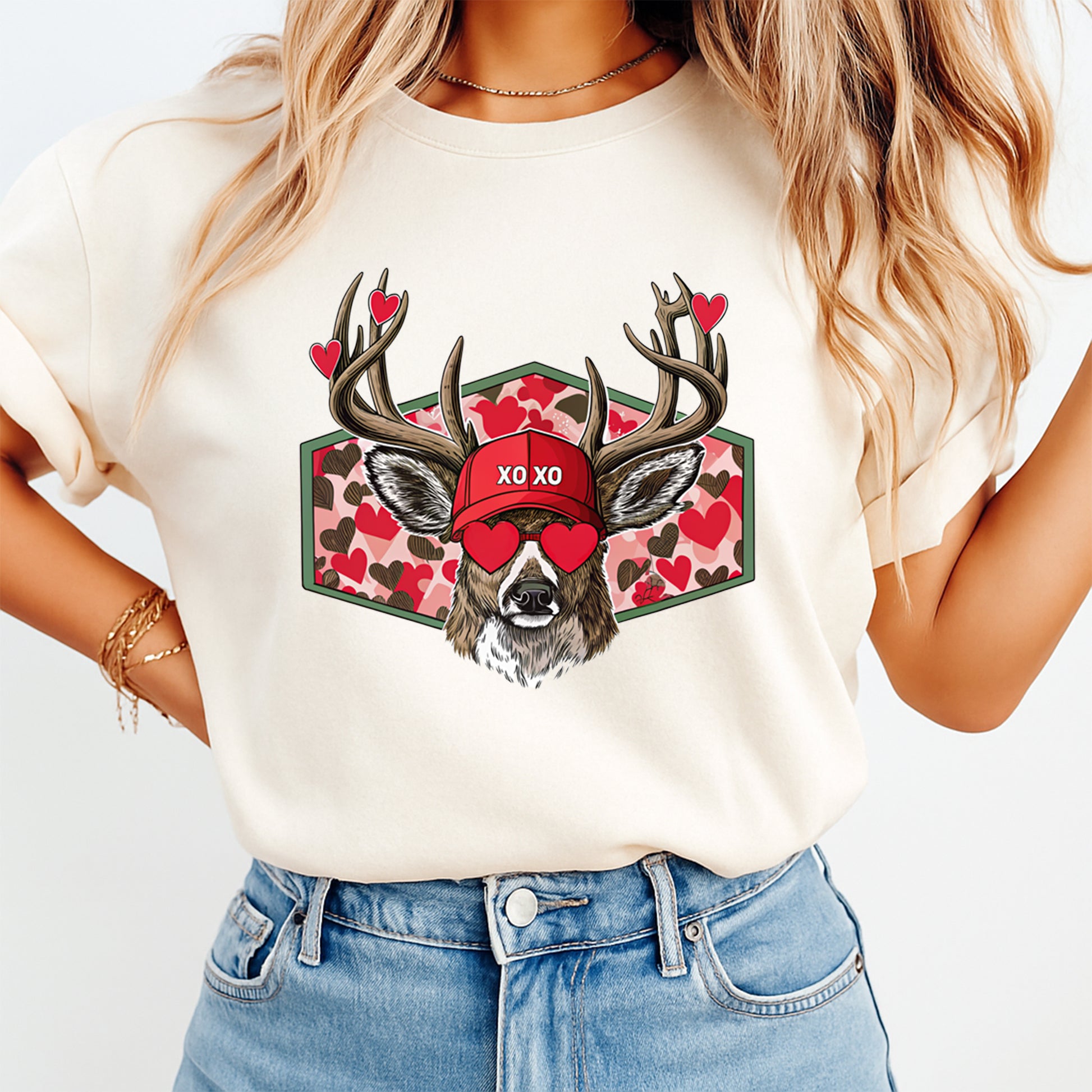 Ready to press dtf Valentine deer graphic shown on a light color t shirt mockup with heart sunglasses and XO XO text