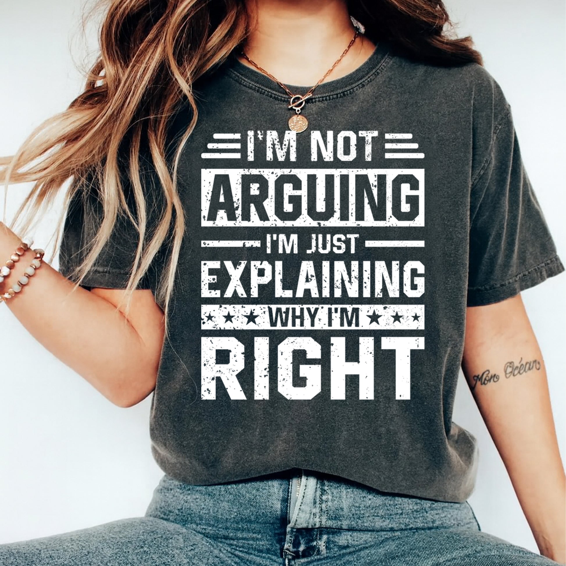i’m not arguing i’m just explaining why i’m right sarcastic quote graphic shown on dark t shirt mockup attitude humor apparel print