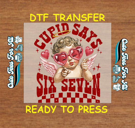 Ready to press dtf Valentine transfer with Cupid Says Six Seven text, cupid illustration, heart sunglasses, wings, halo, and red heart accents