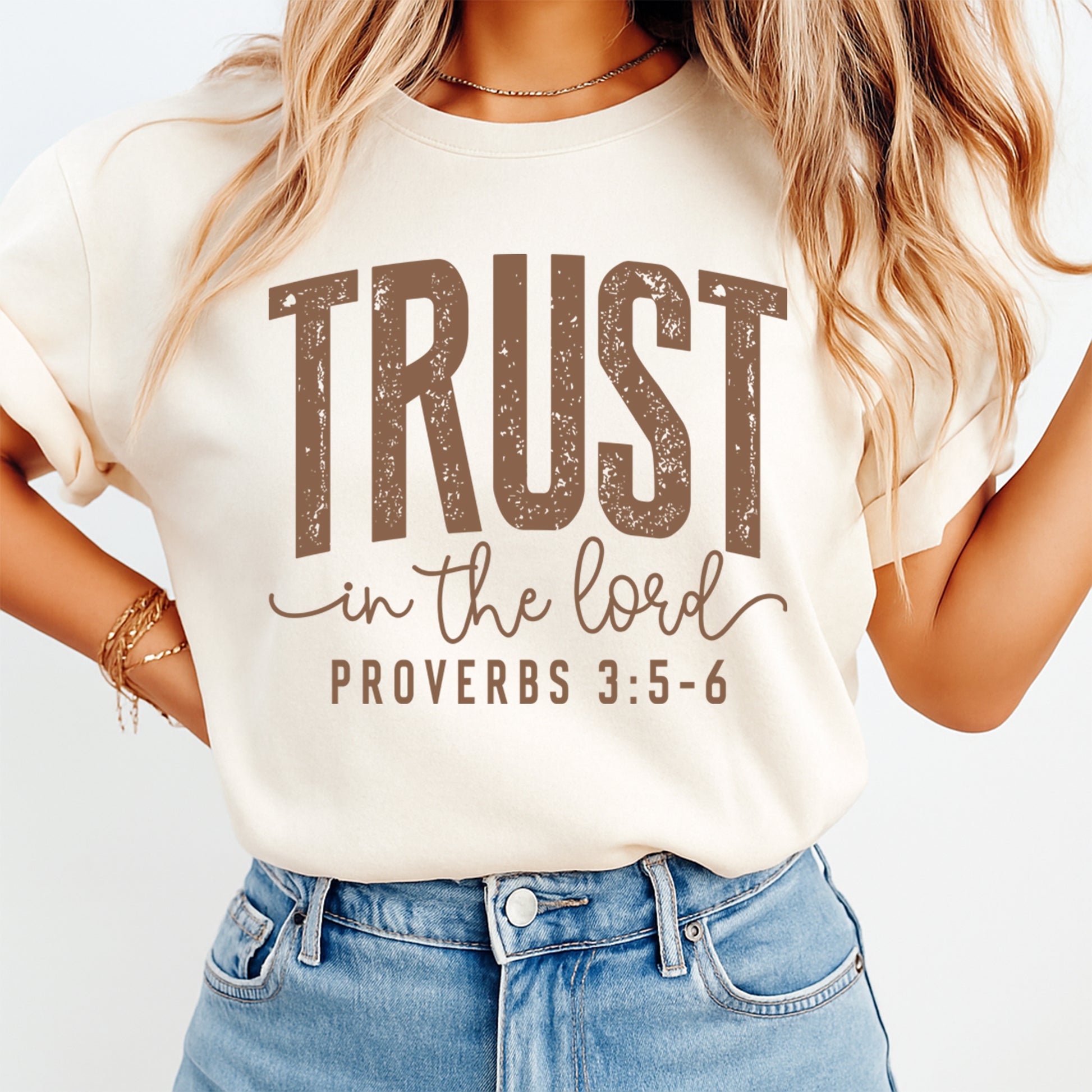 cream shirt mockup showing trust in the lord proverbs 3 5 6 faith scripture graphic