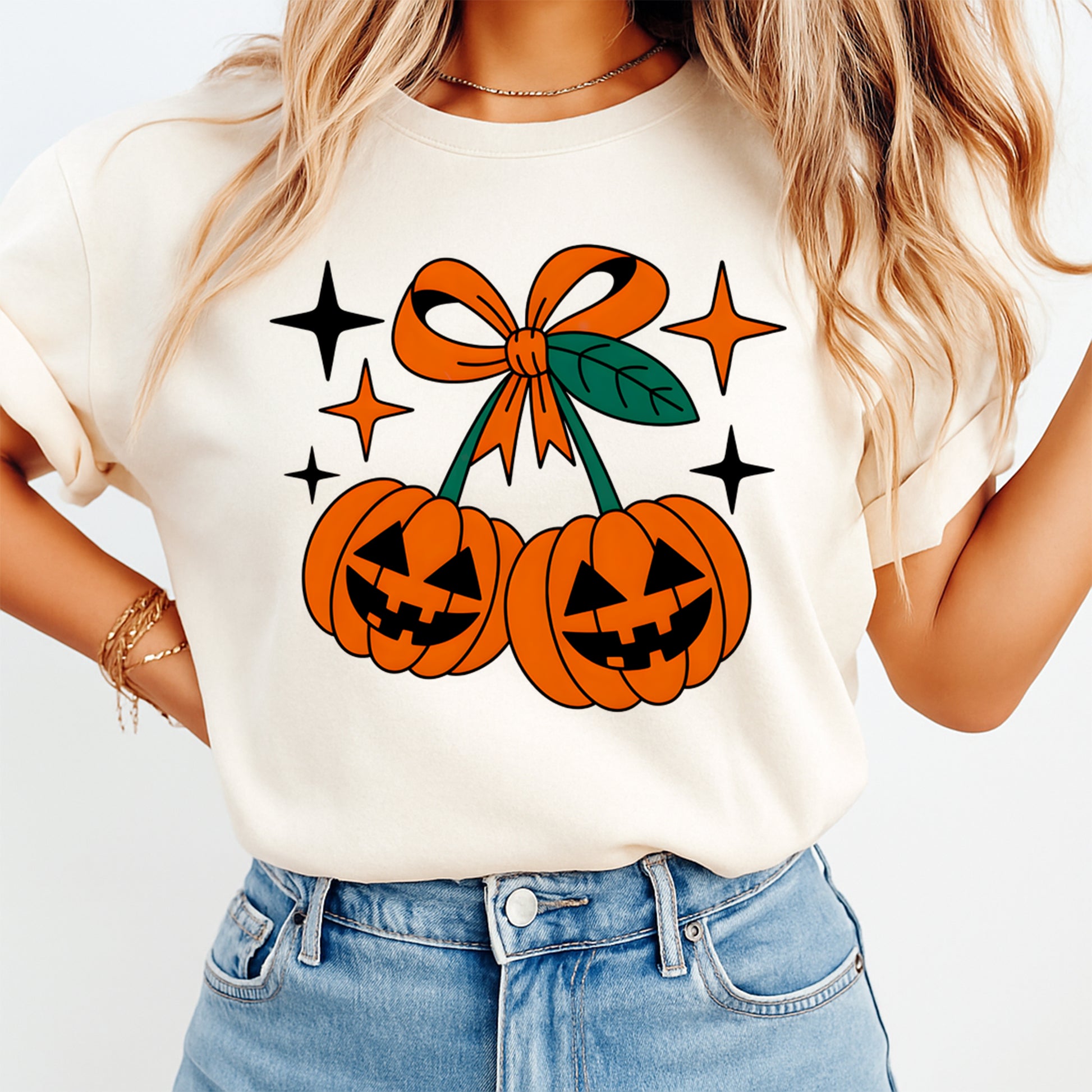 cream shirt mockup showing jack o lantern pumpkin bow halloween graphic