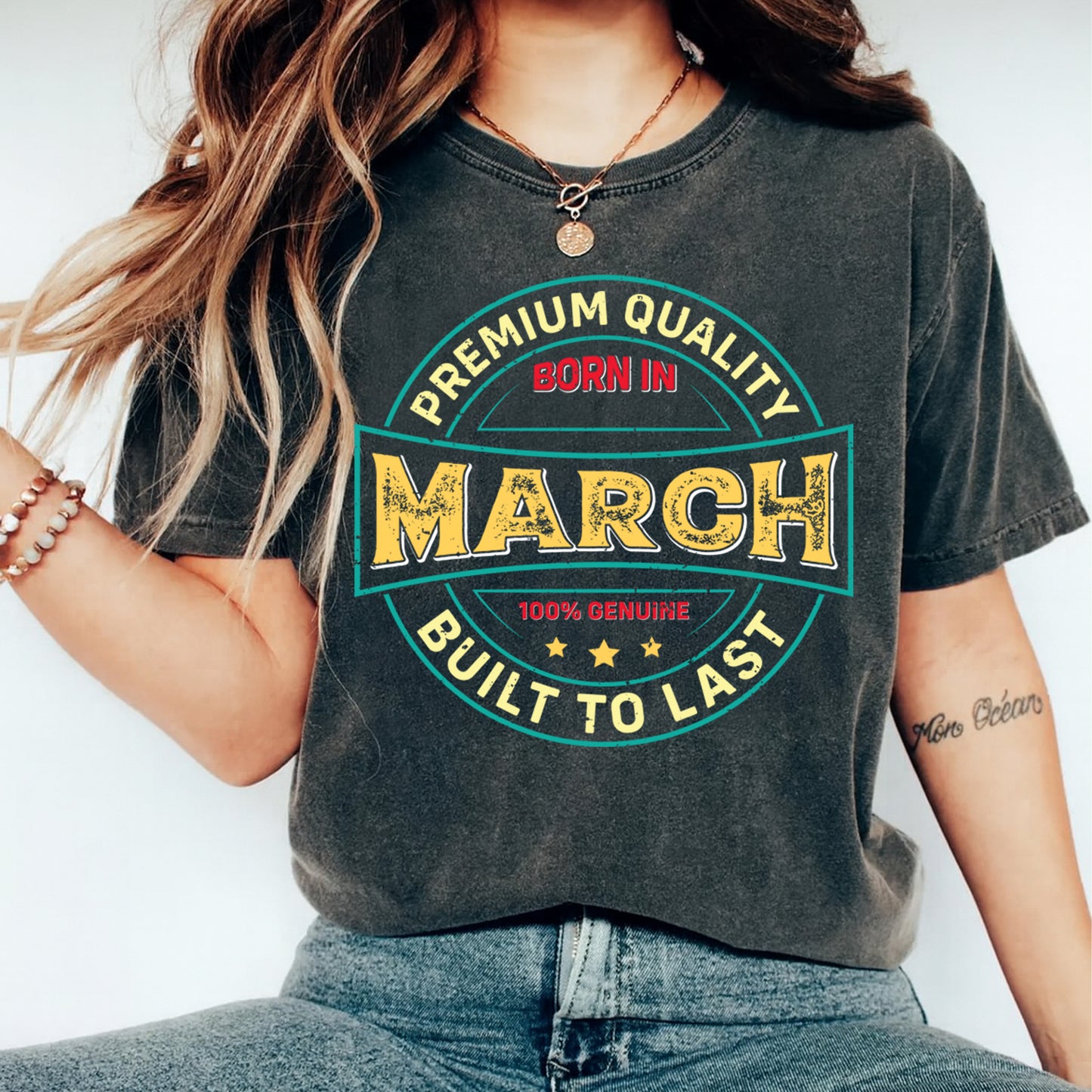 Born in March premium quality vintage badge graphic shown on dark t shirt mockup with bold distressed lettering