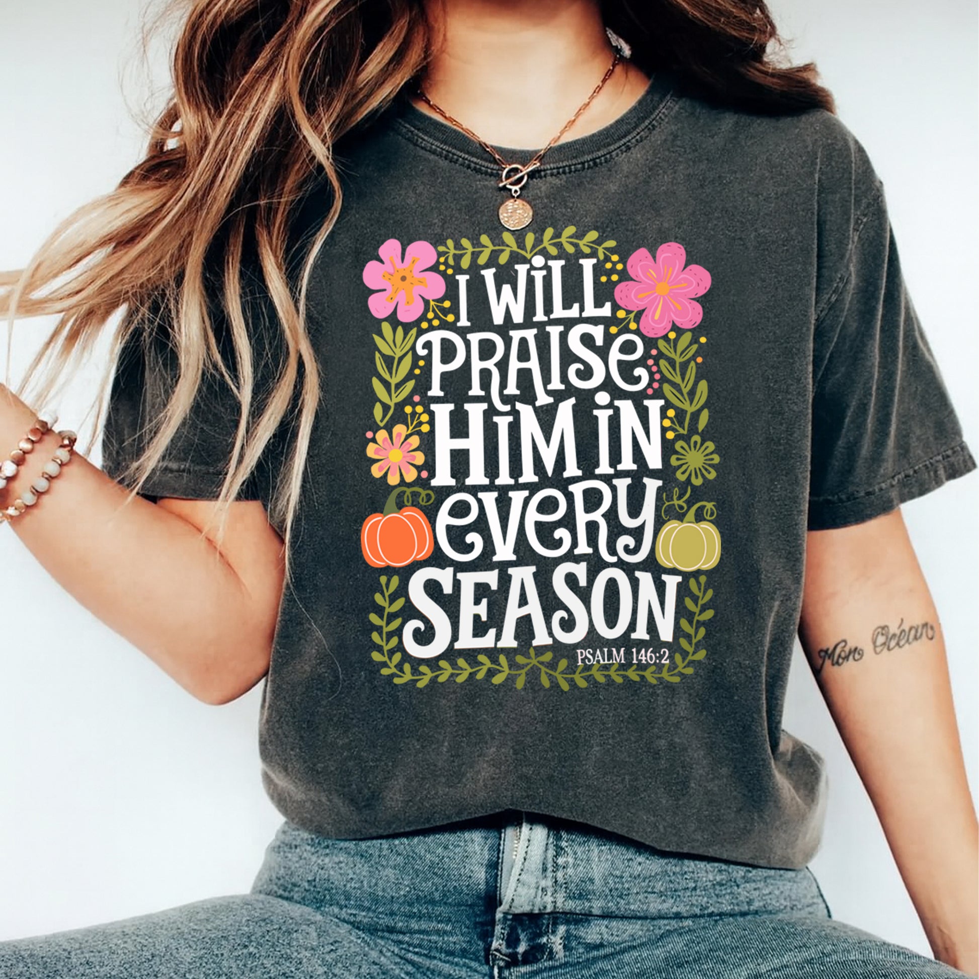 Faith scripture floral design I will praise him every season shown on dark t shirt mockup with seasonal Christian artwork