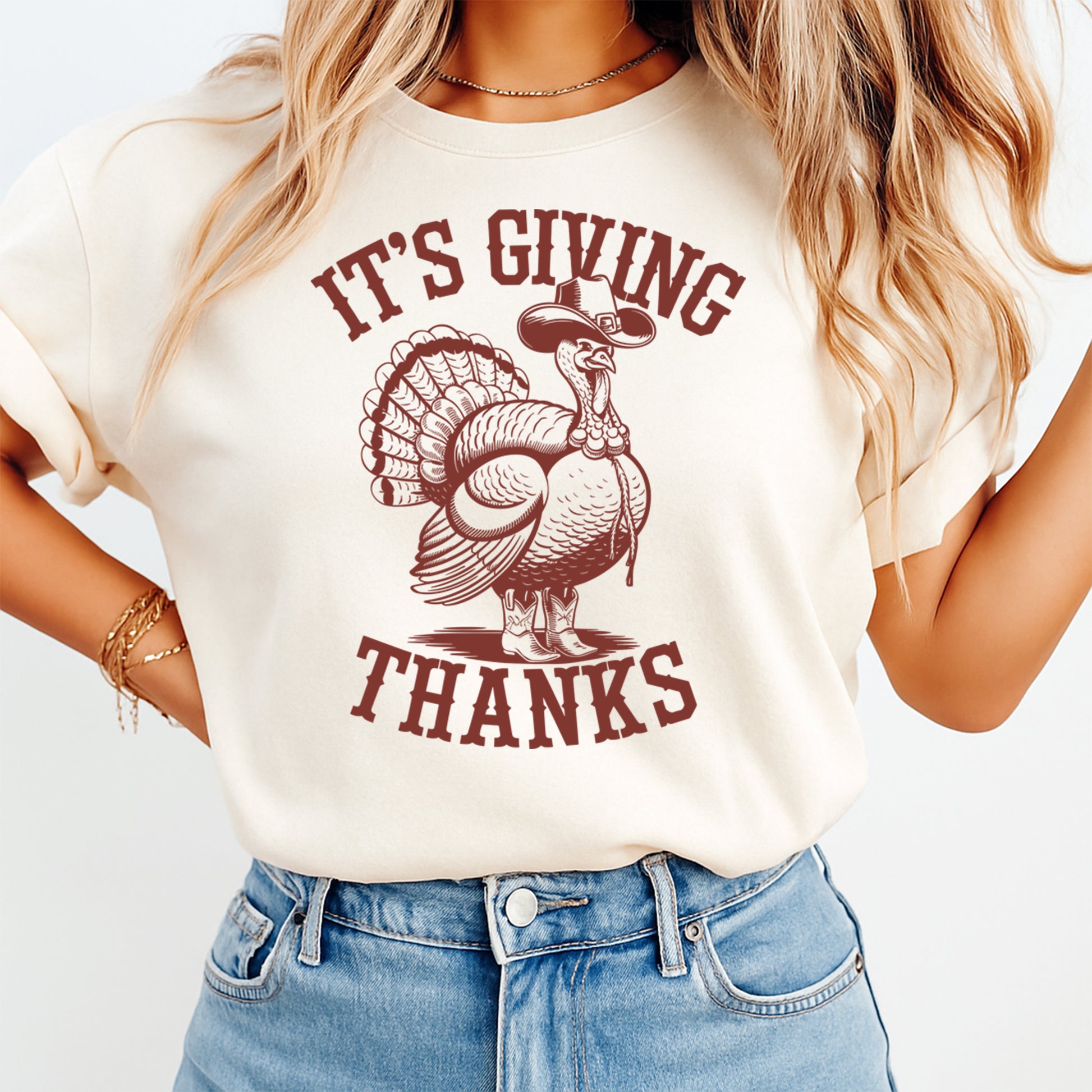 Thanksgiving turkey graphic it’s giving thanks shown on light t shirt mockup with classic fall harvest artwork